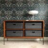 Custom-made bins in dark grey set in a side board
