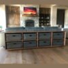 Custom-made bins put in a side board